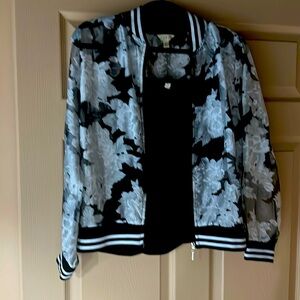 Jacket and Kammie sold together, jacket is extremely light.